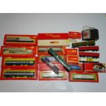 OO Gauge Model Railways: A large quantity of assorted TRI-ANG rolling stock and accessories as