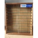 A CORGI vintage wooden and glass shop display case - fitted with 10 glass shelves, and 2 sliding