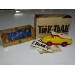 A WRENN MAGICAR and a TRIK-TRAK stunt car (both manufactured by SPOT-ON) VG-E in F/VG boxes (2)