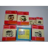 OO Gauge Model Railways: A group of TRI-ANG REAL ESTATE and MODEL-LAND Building Consturction