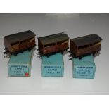 OO Gauge Model Railways: A group of HORNBY DUBLO early post war 3-rail LMS cattle trucks - G in G