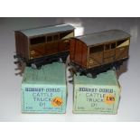 OO Gauge Model Railways: A pair of HORNBY DUBLO early post war 3-rail LMS cattle trucks - G in G