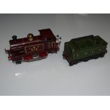 O Gauge Model Railways: A HORNBY SERIES No.1 Clockwork 0-4-0 tank engine in LMS marron livery