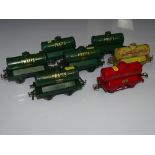 O Gauge Model Railways: A group of HORNBY SERIES No.1 petrol tank wagons in various liveries, some