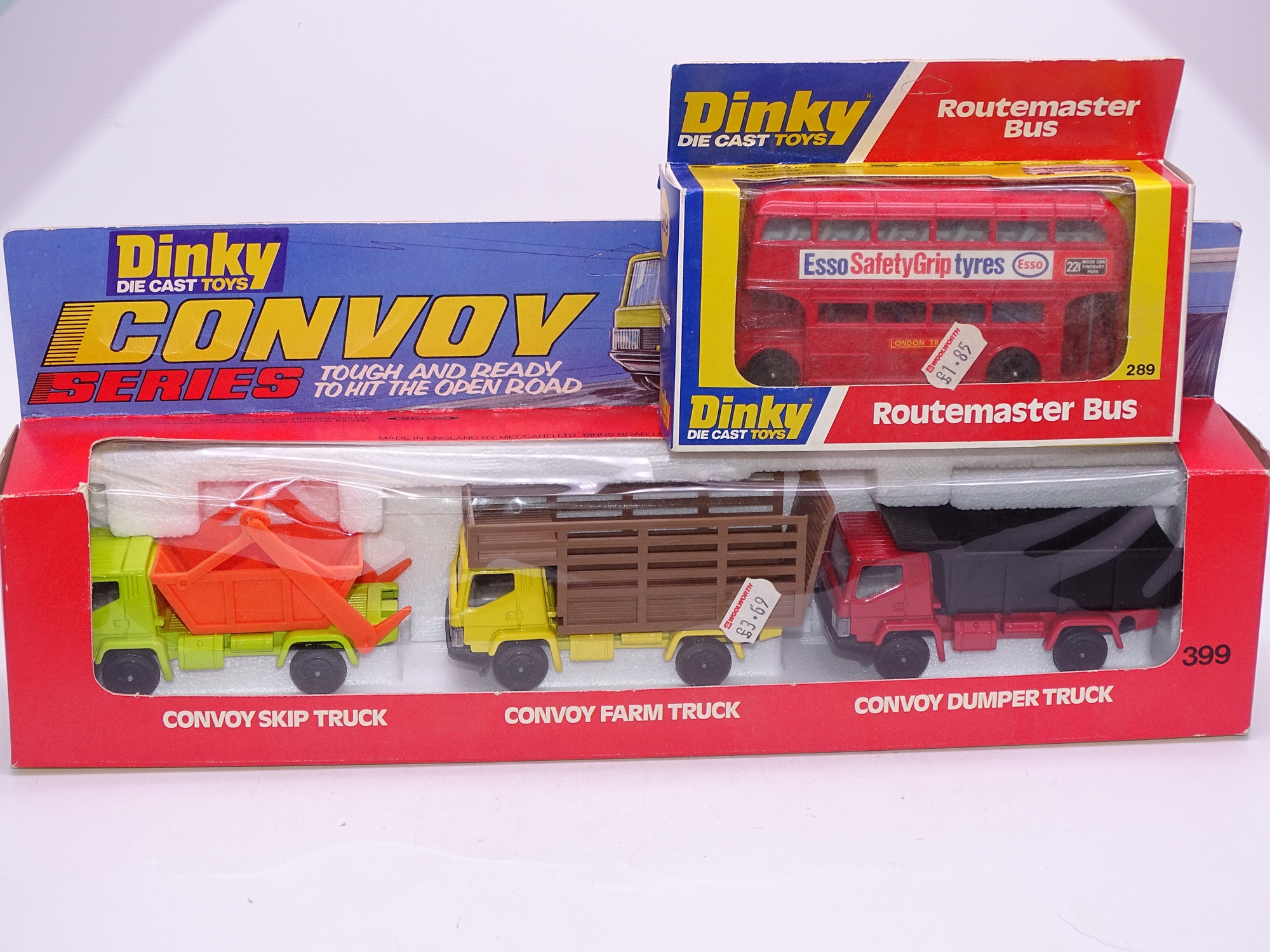 A pair of DINKY toys comprising: A 289 ROUTEMASTER Bus and a 399 CONVOY Gift Set - E - Appear unused