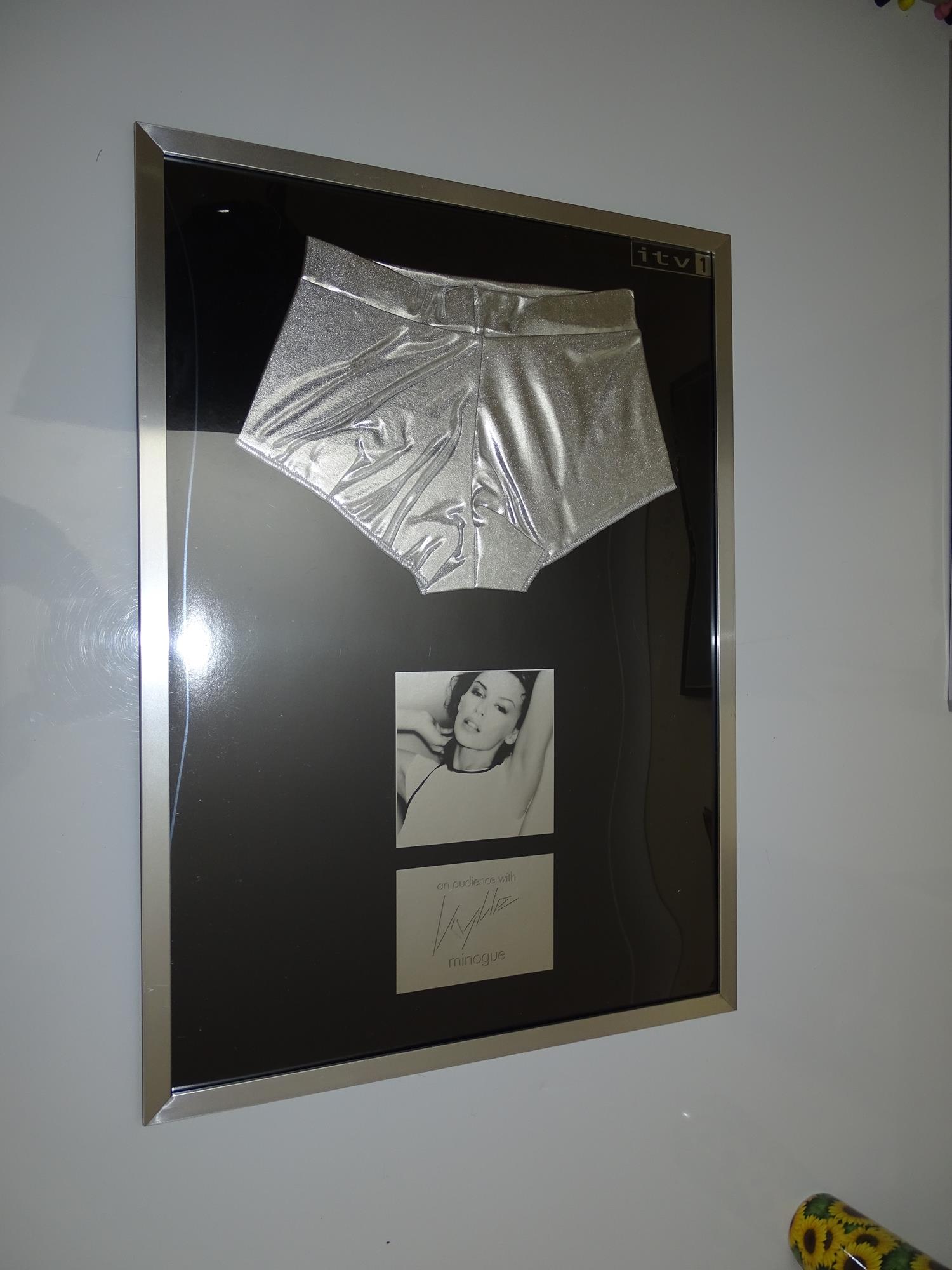 MUSIC MEMORABILIA: 'AN AUDIENCE WITH KYLIE' Framed and Glazed Hot Pants - advertising /