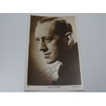 AUTOGRAPH: Signed black and white photograph - ALEC GUINNESS - Excalibur Auctions Certificate of