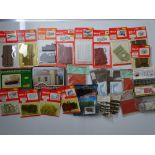 OO GAUGE MODEL RAILWAYS: A large quantity of unbuilt plastic kits and accessories by WILLS, MERIT