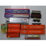 HO GAUGE MODEL RAILWAYS: A mixed group of wagons, coaches and accessories by JOUEF, BRAWA and HORNBY