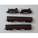 OO GAUGE MODEL RAILWAYS: A small unboxed group comprising 2 x HORNBY steam tank locomotives in BR