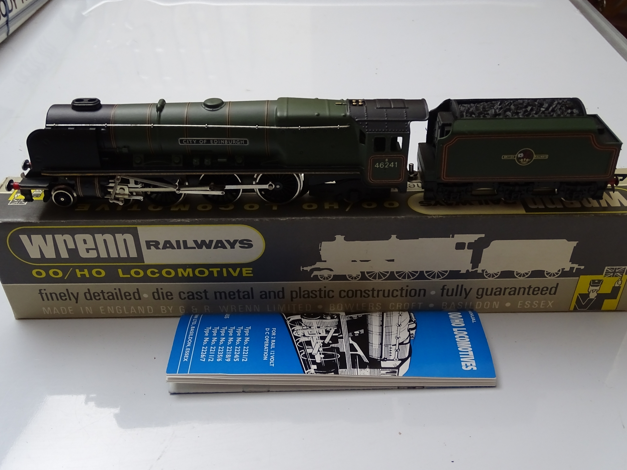 OO GAUGE MODEL RAILWAYS: A W2228/A Duchess Class steam locomotive in BR green livery 'City of