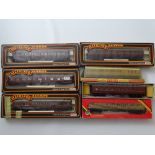 OO GAUGE MODEL RAILWAYS: A mixed group of coaches by MAINLINE, GRAHAM FARISH and HORNBY in various