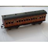 GAUGE 1: A MARKLIN tinplate bogie coach circa 1900/1910 in Great Northern Railway teak livery - G