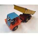 VINTAGE TOYS: A STRENCO plastic and pressed steel operating tipper truck, with swivelling driver - G