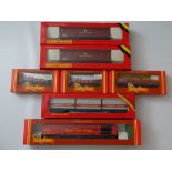 OO GAUGE MODEL RAILWAYS: A group of HORNBY wagons and a travelling mail coach set - G/VG in G