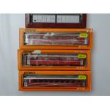 HOm GAUGE MODEL RAILWAYS: A group of 3 x HOm Swiss Outline coaches by BEMO in RHb red liveries