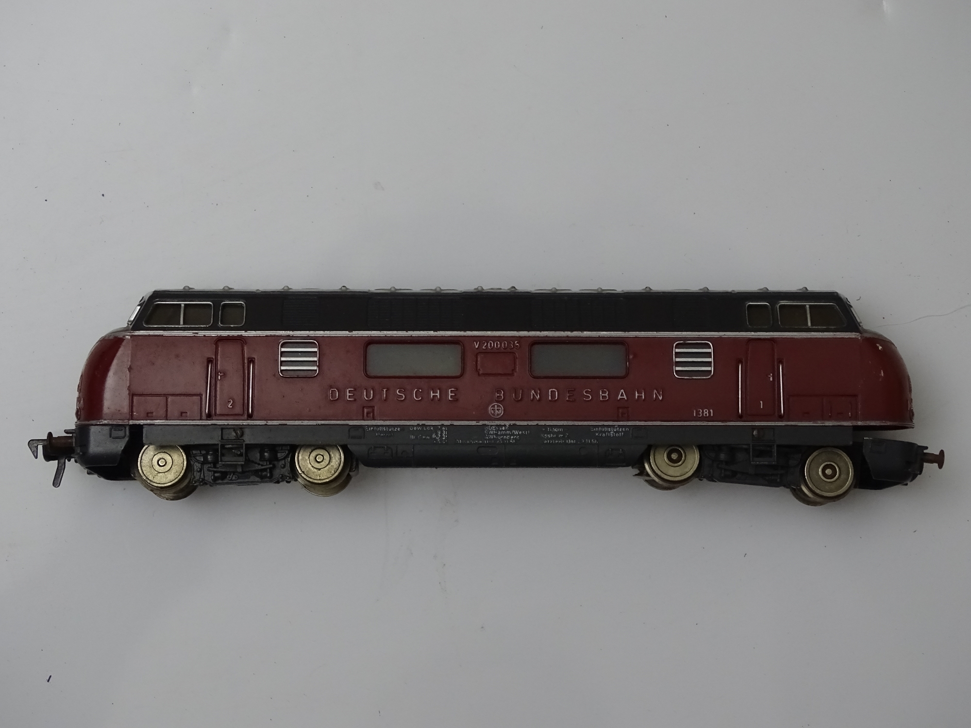 HO GAUGE MODEL RAILWAYS: A vintage FLEISCHMANN V200 Class diesel locomotive in DB red / grey