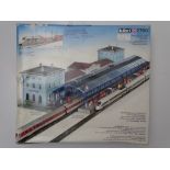 N GAUGE MODEL RAILWAYS: A KIBRI 7700 station and twin canopy kit, unbuilt - as new internally -