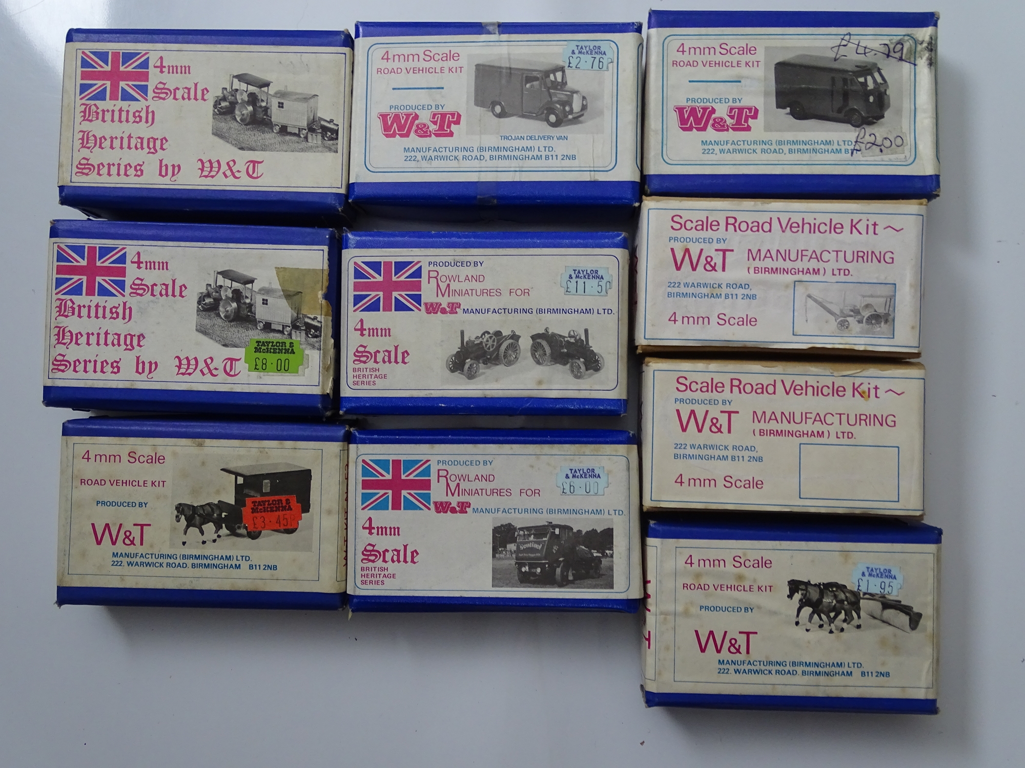 OO GAUGE MODEL RAILWAYS: A group of unbuilt white metal vehicle kits by W & T - contents unchecked