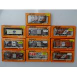 HOm GAUGE MODEL RAILWAYS: A group of BEMO HOm mixed wagons in various liveries - G/VG in F/G