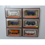 OO GAUGE MODEL RAILWAYS: A small group of DAPOL limited issue wagons - as lotted - VG in G/VG