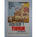 A pair of folded film posters to include: TOBRUK (1967) - One Sheet and THE HIDING PLACE (1975) UK