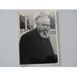 AUTOGRAPH: ORSON WELLES signed 6.5" x 5.5" black / white photograph of the actor / film director -