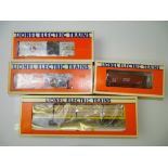 O GAUGE MODEL RAILWAYS: A group of four LIONEL wagons as lotted - VG in G boxes (4)