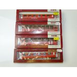 HOm GAUGE MODEL RAILWAYS: A group of BEMO coaches and panoramic coaches in RhB red livery - G/VG