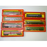 OO GAUGE MODEL RAILWAYS: A group of TRI-ANG coaches to include Transcontinental coaches in three