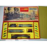 OO GAUGE MODEL RAILWAYS: A TRI-ANG HORNBY RS.62 Car-A-Belle Train Set complete with 12 TRI-IANG