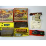 OO GAUGE MODEL RAILWAYS: A pair of TRI-ANG Side Tipping Car Sets (appear complete), together with