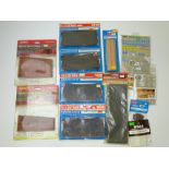 OO GAUGE MODEL RAILWAYS: A quantity of lineside kits and accessories by PECO, HORNBY etc in sealed