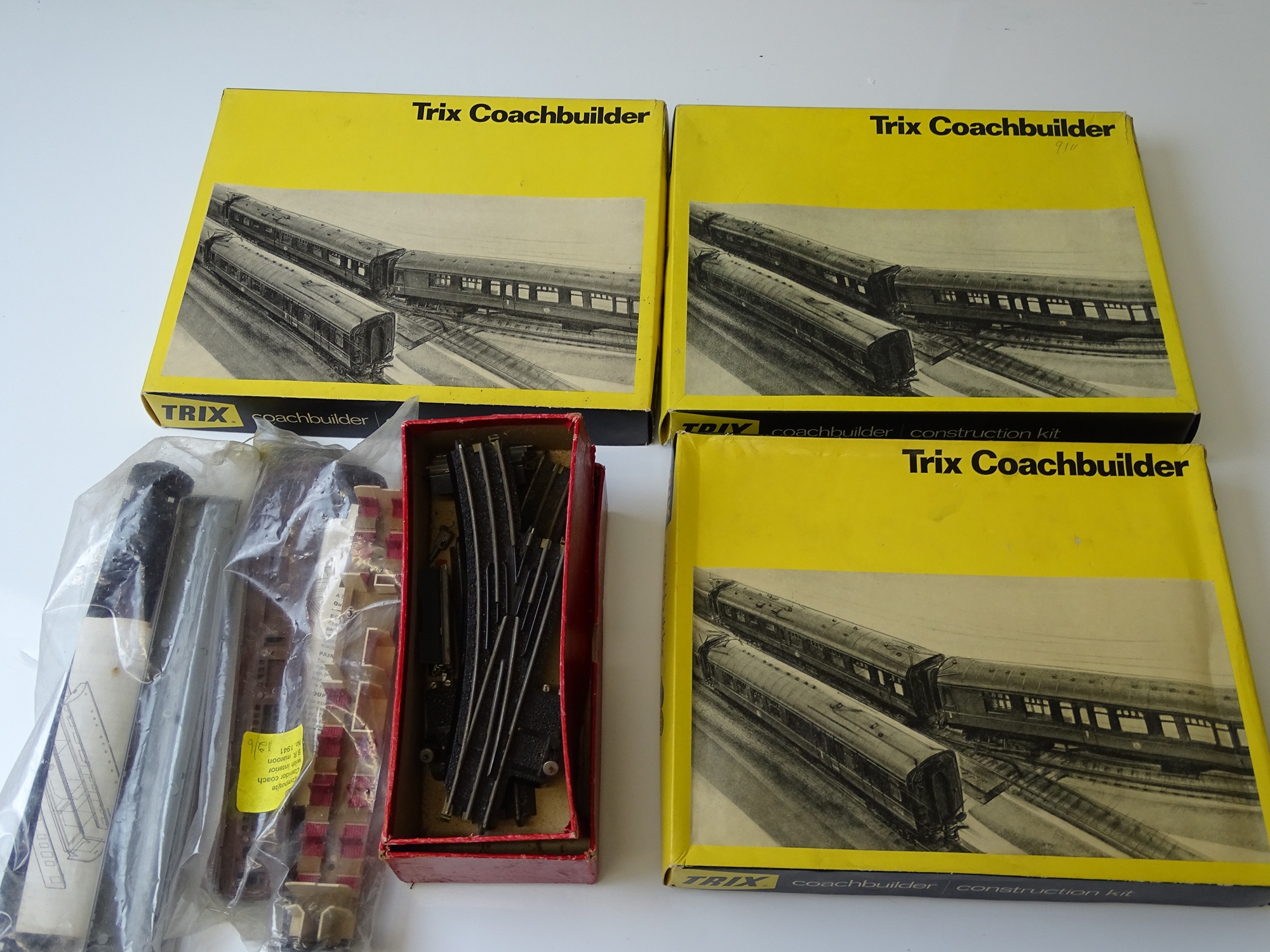 OO GAUGE MODEL RAILWAYS: A group of TRIX Coachbuilder kits - unbuilt - contents unchecked - together