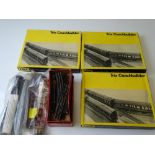 OO GAUGE MODEL RAILWAYS: A group of TRIX Coachbuilder kits - unbuilt - contents unchecked - together