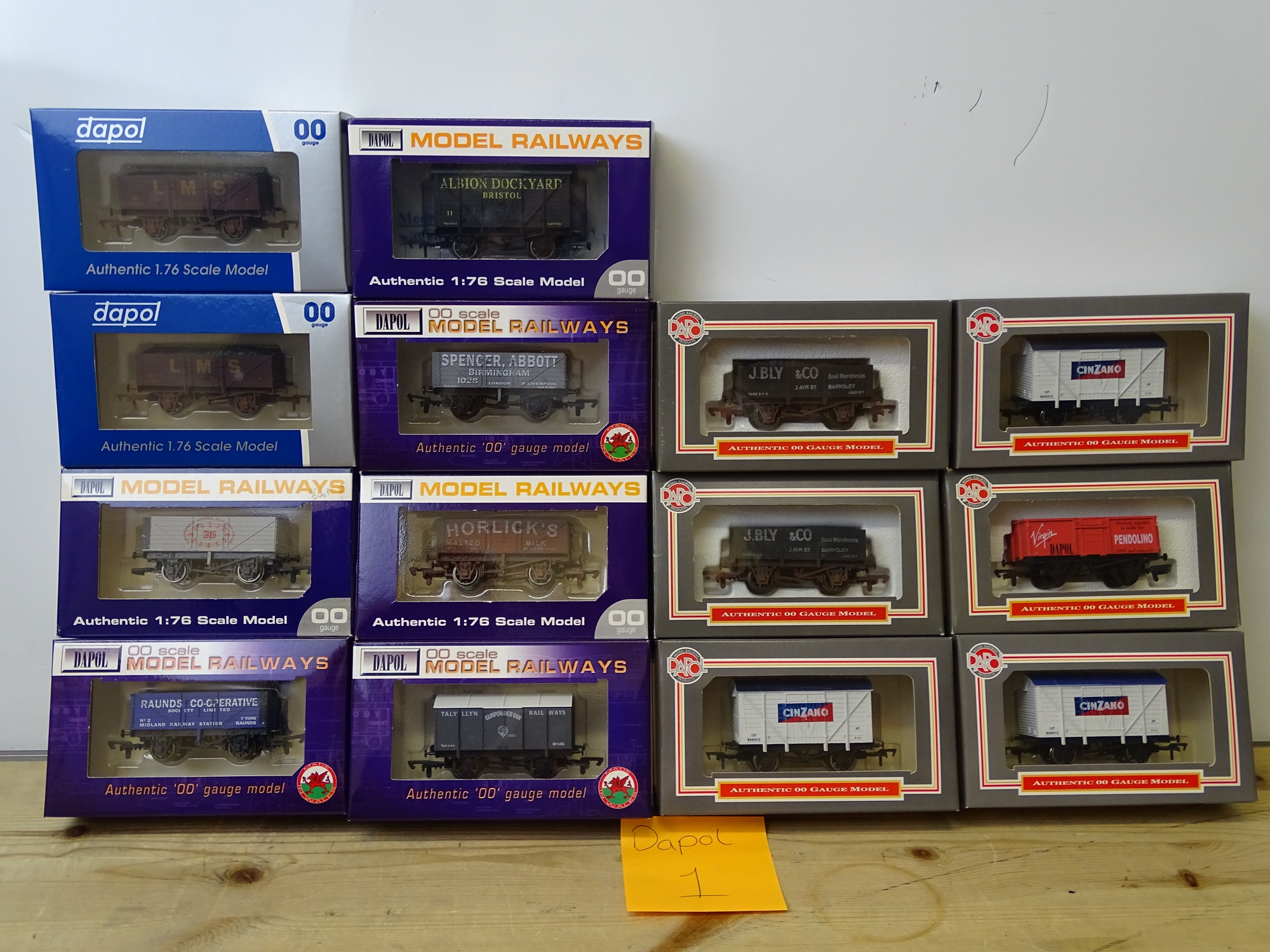 OO GAUGE MODEL RAILWAYS: A group of boxed DAPOL wagons to include limited editions and WRENN Railway