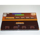 Z GAUGE MODEL RAILWAYS: A MARKLIN 81411 hopper wagon train pack including diesel locomotive - VG