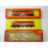 OO GAUGE MODEL RAILWAYS: A pair of R0550 Class F7 diesel locomotives in Transcontinental red