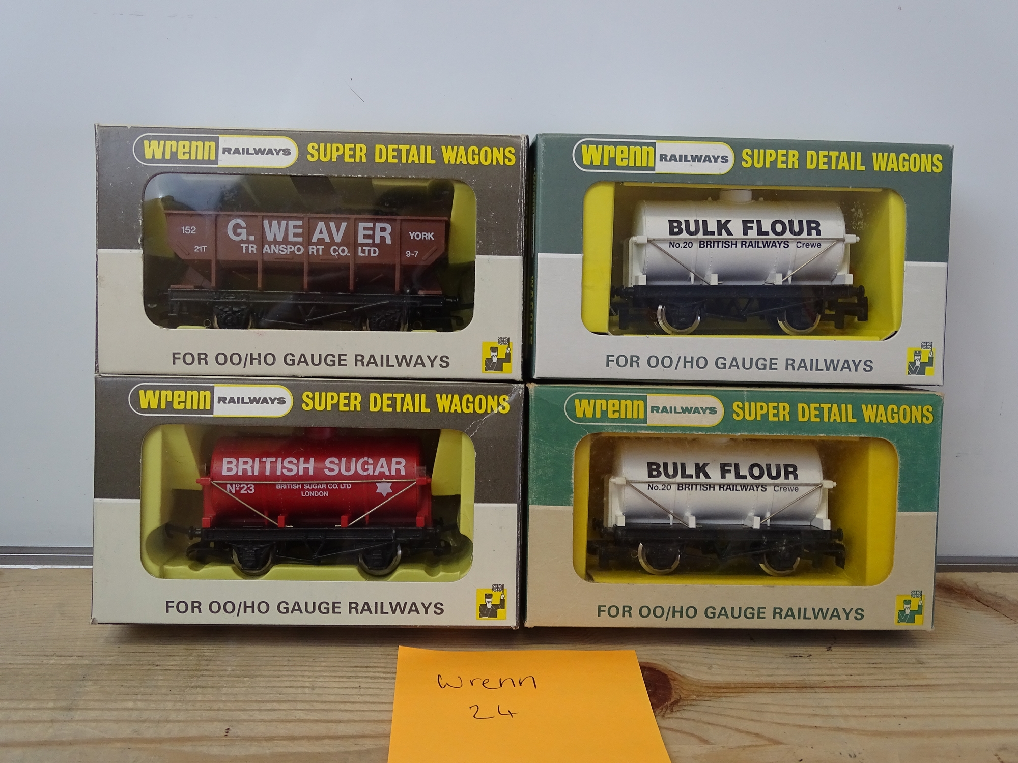OO GAUGE MODEL RAILWAYS: A group of rarer WRENN wagons to include: 2 x W5104 tank wagons together