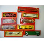 OO/HO GAUGE MODEL RAILWAYS: A group of HORNBY wagons from the Canadian Outline range - mostly