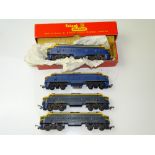 OO GAUGE MODEL RAILWAYS: A group of TRI-ANG double ended diesel locomotives in various blue liveries