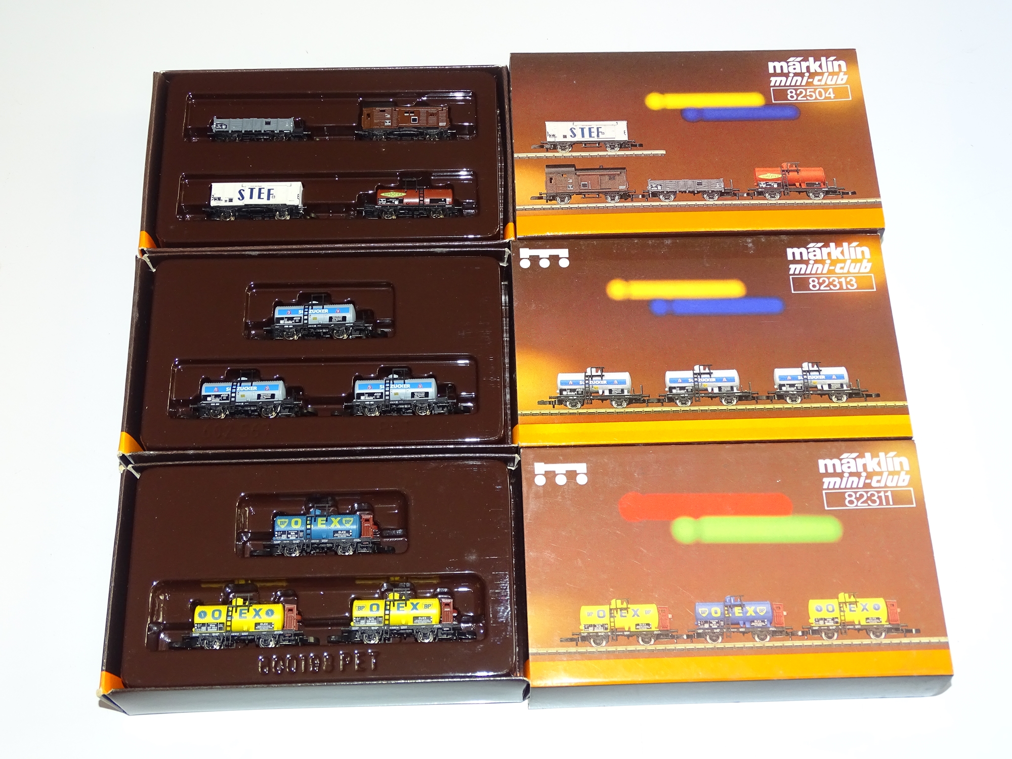 Z GAUGE MODEL RAILWAYS: A trio of MARKLIN wagon packs comprising: 82311, 82313 and 82504 - mostly