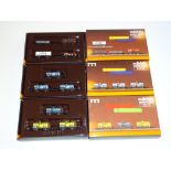 Z GAUGE MODEL RAILWAYS: A trio of MARKLIN wagon packs comprising: 82311, 82313 and 82504 - mostly