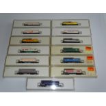 Z GAUGE MODEL RAILWAYS: A quantity of MARKLIN bogie tank wagons as lotted - VG in G boxes (13)