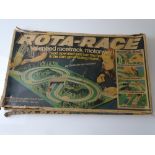VINTAGE TOYS: A TRI-ANG Rota-Race motorway game - comprising hand operated layout and two TRI-ANG
