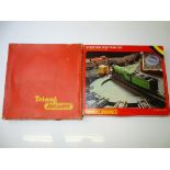 OO GAUGE MODEL RAILWAYS: A pair of operating turntable sets by TRI-ANG and HORNBY - appear