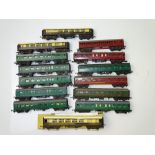 TT GAUGE MODEL RAILWAYS: A group of mostly unboxed coaches by TRI-ANG in various liveries - F/G (