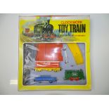 OO GAUGE MODEL RAILWAYS: A HORNBY clockwork Toy Train set - G/VG in G box