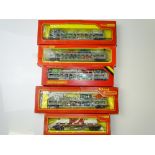OO GAUGE MODEL RAILWAYS: A group of TRI-ANG car carriers comprising 4x Car-a-belle wagons each
