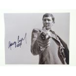 AUTOGRAPHS: JAMES BOND: ON HER MAJESTY'S SECRET SERVICE - A pair of signed 10x8 photographs of